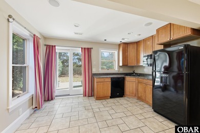 6005 S North Shore Ct sits in the Village at Nags Head, a on Nags Head Golf Links in North Carolina - for sale on GolfHomes.com, golf home, golf lot