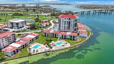 Experience Waterfront Living in this Charming 2-Bed, 2-Bath on Isla Del Sol Yacht and Country Club in Florida - for sale on GolfHomes.com, golf home, golf lot