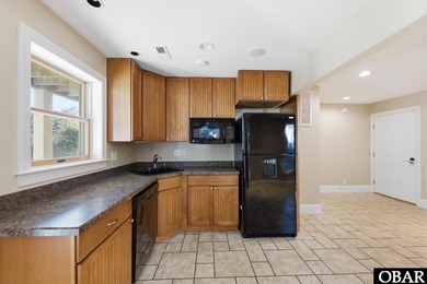 6005 S North Shore Ct sits in the Village at Nags Head, a on Nags Head Golf Links in North Carolina - for sale on GolfHomes.com, golf home, golf lot