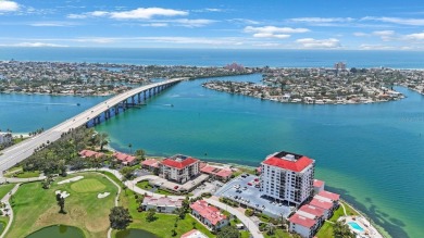Experience Waterfront Living in this Charming 2-Bed, 2-Bath on Isla Del Sol Yacht and Country Club in Florida - for sale on GolfHomes.com, golf home, golf lot