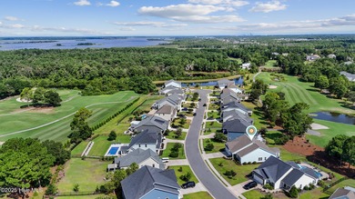 Situated on the 16th green of the Beau Rivage Golf Course, this on Beau Rivage Golf and Resort in North Carolina - for sale on GolfHomes.com, golf home, golf lot