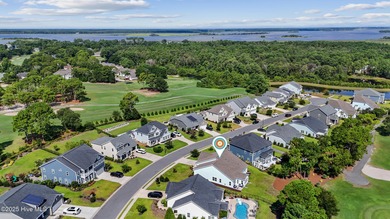 Situated on the 16th green of the Beau Rivage Golf Course, this on Beau Rivage Golf and Resort in North Carolina - for sale on GolfHomes.com, golf home, golf lot