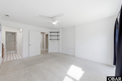 6005 S North Shore Ct sits in the Village at Nags Head, a on Nags Head Golf Links in North Carolina - for sale on GolfHomes.com, golf home, golf lot