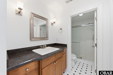 6005 S North Shore Ct sits in the Village at Nags Head, a on Nags Head Golf Links in North Carolina - for sale on GolfHomes.com, golf home, golf lot