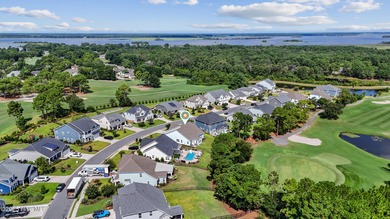 Situated on the 16th green of the Beau Rivage Golf Course, this on Beau Rivage Golf and Resort in North Carolina - for sale on GolfHomes.com, golf home, golf lot