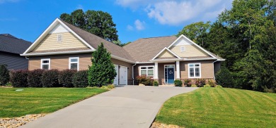Discover the epitome of upscale living in this meticulously on Tellico Village -The Links At Kahite Golf Course in Tennessee - for sale on GolfHomes.com, golf home, golf lot