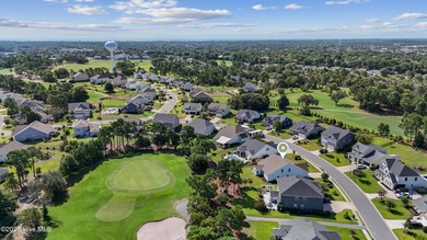 Situated on the 16th green of the Beau Rivage Golf Course, this on Beau Rivage Golf and Resort in North Carolina - for sale on GolfHomes.com, golf home, golf lot