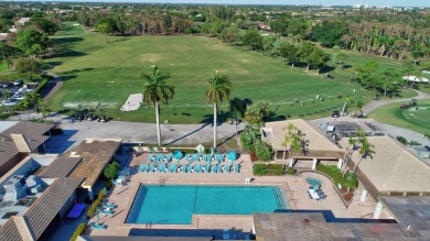BEAUTIFUL LIGHT AND BRIGHT 2 BEDROOM, 2.5 BATH TOWNHOUSE ON GOLF on Boca Lago Golf and Country Club in Florida - for sale on GolfHomes.com, golf home, golf lot