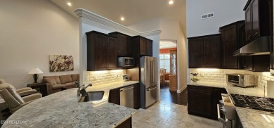 Discover the epitome of upscale living in this meticulously on Tellico Village -The Links At Kahite Golf Course in Tennessee - for sale on GolfHomes.com, golf home, golf lot