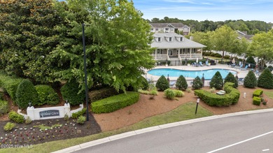 Situated on the 16th green of the Beau Rivage Golf Course, this on Beau Rivage Golf and Resort in North Carolina - for sale on GolfHomes.com, golf home, golf lot