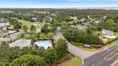 Situated on the 16th green of the Beau Rivage Golf Course, this on Beau Rivage Golf and Resort in North Carolina - for sale on GolfHomes.com, golf home, golf lot