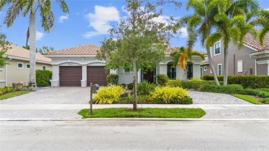 Gorgeous single story 3 bedroom 2 bath home w/custom pool/spa on Parkland Golf Club in Florida - for sale on GolfHomes.com, golf home, golf lot