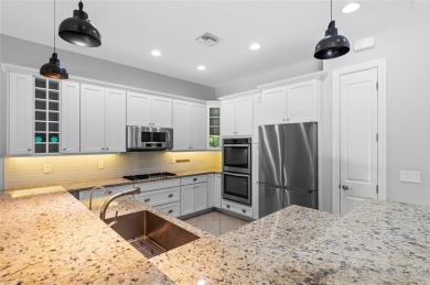 Gorgeous single story 3 bedroom 2 bath home w/custom pool/spa on Parkland Golf Club in Florida - for sale on GolfHomes.com, golf home, golf lot