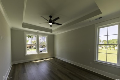 Step into luxury coastal living in Waterway Palms Plantation on Myrtlewood Golf Course and Club  in South Carolina - for sale on GolfHomes.com, golf home, golf lot