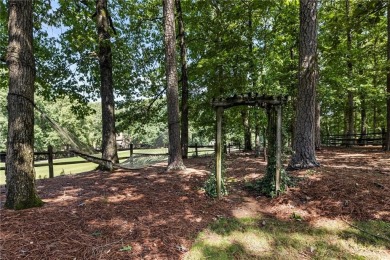 Tucked away on a desirable cul de sac street on the 3rd Fairway on Country Club of Roswell in Georgia - for sale on GolfHomes.com, golf home, golf lot