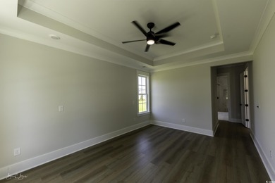 Step into luxury coastal living in Waterway Palms Plantation on Myrtlewood Golf Course and Club  in South Carolina - for sale on GolfHomes.com, golf home, golf lot