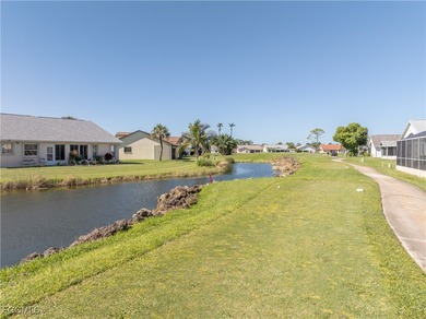 This beautifully updated home has been completely transformed on Sabal Springs Golf and Racquet Club in Florida - for sale on GolfHomes.com, golf home, golf lot