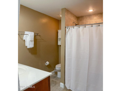 Beautifully located home is just a short golf cart ride from all on Ocean Point Golf Links in South Carolina - for sale on GolfHomes.com, golf home, golf lot