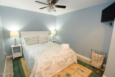 Beautifully located home is just a short golf cart ride from all on Ocean Point Golf Links in South Carolina - for sale on GolfHomes.com, golf home, golf lot