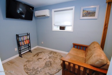 Beautifully located home is just a short golf cart ride from all on Ocean Point Golf Links in South Carolina - for sale on GolfHomes.com, golf home, golf lot