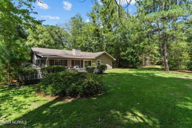 Tucked away on a quiet cul-de-sac location with golf course on Carolina Shores Golf Course in North Carolina - for sale on GolfHomes.com, golf home, golf lot