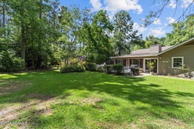 Tucked away on a quiet cul-de-sac location with golf course on Carolina Shores Golf Course in North Carolina - for sale on GolfHomes.com, golf home, golf lot