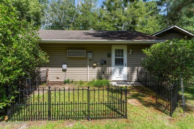 Tucked away on a quiet cul-de-sac location with golf course on Carolina Shores Golf Course in North Carolina - for sale on GolfHomes.com, golf home, golf lot