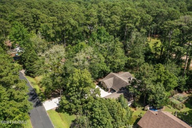 Tucked away on a quiet cul-de-sac location with golf course on Carolina Shores Golf Course in North Carolina - for sale on GolfHomes.com, golf home, golf lot