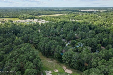 Tucked away on a quiet cul-de-sac location with golf course on Carolina Shores Golf Course in North Carolina - for sale on GolfHomes.com, golf home, golf lot