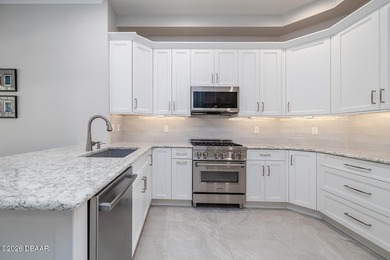 Halifax Plantation pool home. Immaculately maintained. Built by on Halifax Plantation Golf Club in Florida - for sale on GolfHomes.com, golf home, golf lot