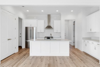 This Bella XL plan, with an alternate elevation, has 3 bedrooms on Origins Golf Club in Florida - for sale on GolfHomes.com, golf home, golf lot