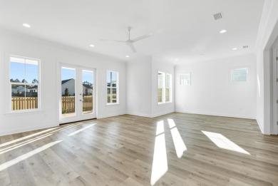 This Bella XL plan, with an alternate elevation, has 3 bedrooms on Origins Golf Club in Florida - for sale on GolfHomes.com, golf home, golf lot