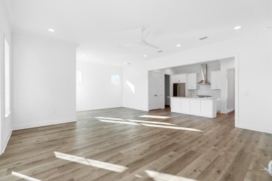 This Bella XL plan, with an alternate elevation, has 3 bedrooms on Origins Golf Club in Florida - for sale on GolfHomes.com, golf home, golf lot