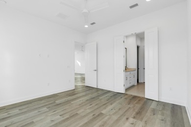 This Bella XL plan, with an alternate elevation, has 3 bedrooms on Origins Golf Club in Florida - for sale on GolfHomes.com, golf home, golf lot