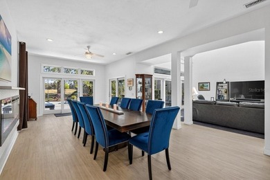 Stunning contemporary architecture frames the wide open interior on Plantation Bay Golf and Country Club in Florida - for sale on GolfHomes.com, golf home, golf lot