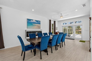 Stunning contemporary architecture frames the wide open interior on Plantation Bay Golf and Country Club in Florida - for sale on GolfHomes.com, golf home, golf lot