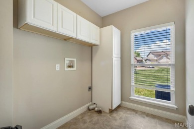 Beautiful McKelvey built 1.5-story nestled in a highly desirable on The Falls Golf Club in Missouri - for sale on GolfHomes.com, golf home, golf lot
