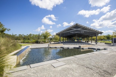This Bella XL plan, with an alternate elevation, has 3 bedrooms on Origins Golf Club in Florida - for sale on GolfHomes.com, golf home, golf lot