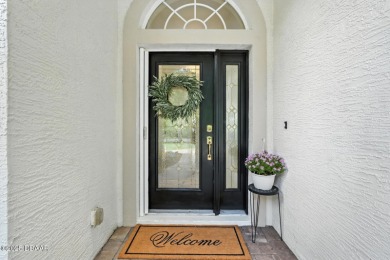 Welcome to your dream home in the highly sought-after Halifax on Halifax Plantation Golf Club in Florida - for sale on GolfHomes.com, golf home, golf lot