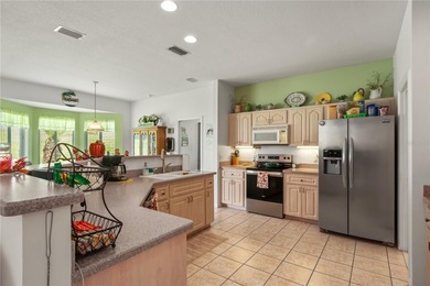 Experience golf course living at its most inviting- Situated on Ocala Palms Golf and Country Club in Florida - for sale on GolfHomes.com, golf home, golf lot