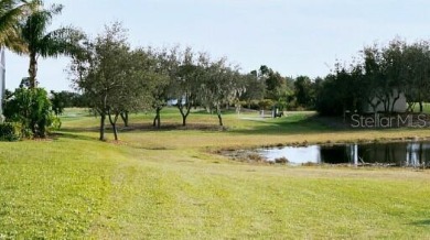 What a view!  Both golf course and lake view will be yours to on Rotonda Golf and Country Club The Links Course in Florida - for sale on GolfHomes.com, golf home, golf lot