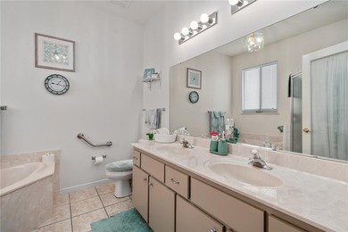 Experience golf course living at its most inviting- Situated on Ocala Palms Golf and Country Club in Florida - for sale on GolfHomes.com, golf home, golf lot