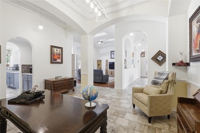 Beautifully updated 4BR/3BA custom home with a 3-car garage on The Grand Club - Pine Lakes Course in Florida - for sale on GolfHomes.com, golf home, golf lot