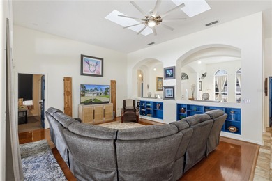 Beautifully updated 4BR/3BA custom home with a 3-car garage on The Grand Club - Pine Lakes Course in Florida - for sale on GolfHomes.com, golf home, golf lot