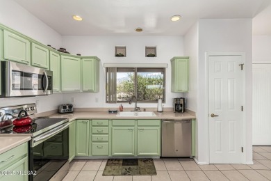 Located in the serene and sought-after Vistoso Resort Casitas on The Golf Club at Vistoso in Arizona - for sale on GolfHomes.com, golf home, golf lot
