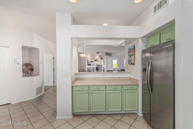 Located in the serene and sought-after Vistoso Resort Casitas on The Golf Club at Vistoso in Arizona - for sale on GolfHomes.com, golf home, golf lot