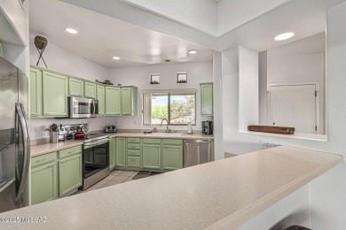 Located in the serene and sought-after Vistoso Resort Casitas on The Golf Club at Vistoso in Arizona - for sale on GolfHomes.com, golf home, golf lot
