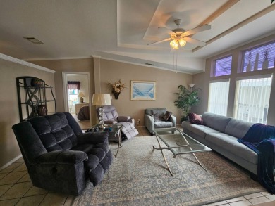 Located in a 55+ resort-style manufactured home community on on Big Cypress Golf and Country Club in Florida - for sale on GolfHomes.com, golf home, golf lot