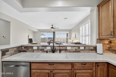 55+ living at its best! Welcome to this updated, low-maintenance on The Golf Club At Johnson Ranch in Arizona - for sale on GolfHomes.com, golf home, golf lot