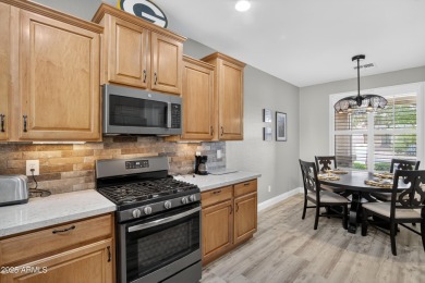 55+ living at its best! Welcome to this updated, low-maintenance on The Golf Club At Johnson Ranch in Arizona - for sale on GolfHomes.com, golf home, golf lot